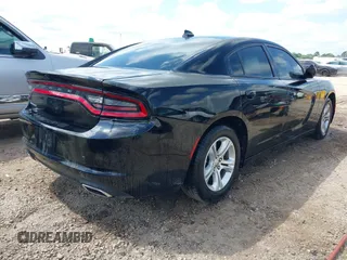 2023 Dodge Charger SXT with VIN 2C3CDXBG2PH550671, listed as a IAAI auction lot 42123200 with 50,818 mi miles. Bid and sale history available at carsss.com. Image 4.