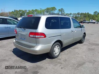 2001 Toyota Sienna LE with VIN 4T3ZF13CX1U372072, listed as a IAAI auction lot 41889291 with 228,959 mi miles. Bid and sale history available at carsss.com. Image 4.
