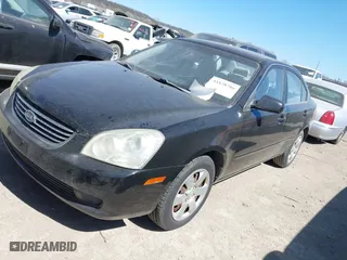 2008 Kia Optima LX with VIN KNAGE123985242231, listed as a IAAI auction lot 41838786 with 217,754 mi miles. Bid and sale history available at carsss.com. Image 2.