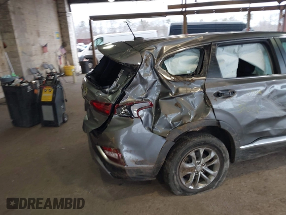 2019 Hyundai Santa Fe SE with VIN 5NMS2CAD7KH094144, listed as a IAAI auction lot 41984633 with 46,307 mi miles and . Bid and sale history available at DreamBid. Image 14.