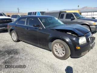 2009 Chrysler 300 LX with VIN 2C3KA43D59H529761, listed as a Copart auction lot 44260275 with 135,802 mi miles and Salvage Title. Bid and sale history available at carsss.com. Image 4.