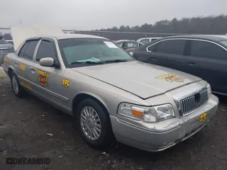 2007 Mercury Grand Marquis LS with VIN 2MEFM75V77X637957, listed as a IAAI auction lot 41520607 with 168,313 mi miles. Bid and sale history available at carsss.com. Image 1.