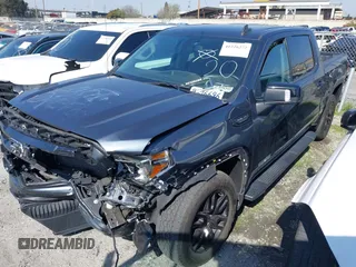 2022 GMC Sierra 1500 Limited Elevation with VIN 1GTU9CED8NZ180495, listed as a IAAI auction lot 41226272 with 20,287 mi miles. Bid and sale history available at carsss.com. Image 2.