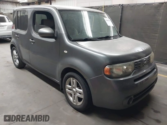 2011 Nissan Cube 1.8 SL with VIN JN8AZ2KR2BT212311, listed as a IAAI auction lot 42002493 with 128,372 mi miles. Bid and sale history available at carsss.com. Image 1.