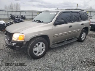 2002 GMC Envoy SLT with VIN 1GKDT13S522425155, listed as a Copart auction lot 48575895 with 52,307 mi miles and Salvage Title. Bid and sale history available at carsss.com. Image 1.