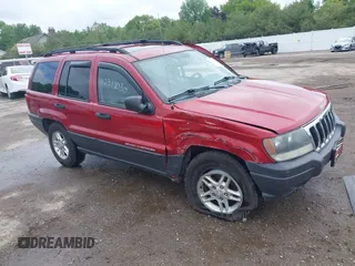 2003 Jeep Grand Cherokee Laredo z VIN 1J4GW48S73C611070, wystawiony jako IAAI lot #42319030 z przebiegiem 177 771 mil mil oraz . Historia ofert i sprzedaży dostępna na DreamBid. Obrazek 1.