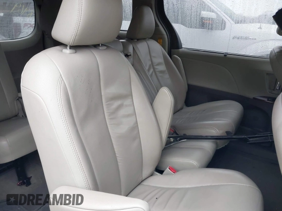 2014 Toyota Sienna XLE with VIN 5TDYK3DC0ES510579, listed as a IAAI auction lot 41470424 with 304,620 mi miles and . Bid and sale history available at DreamBid. Image 8.