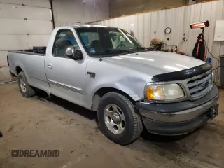 2002 Ford F-150 XL z VIN 1FTRF17W92NB99531, wystawiony jako Copart lot #49585545 z przebiegiem 148 167 mil mil oraz Szkoda całkowita • Salvage title. Historia ofert i sprzedaży dostępna na DreamBid. Obrazek 4.