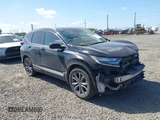 2021 Honda CR-V Touring with VIN 2HKRW2H96MH681908, listed as a IAAI auction lot 42082535 with 65,570 mi miles and . Bid and sale history available at DreamBid. Image 1.