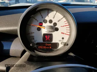 2012 MINI Coupe S z VIN WMWSX3C55CT155429, wystawiony jako Copart lot #78285654 z przebiegiem 78 238 mil mil oraz Szkody całkowita. Historia ofert i sprzedaży dostępna na DreamBid. Obrazek 9.