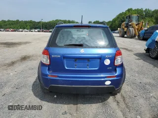 2012 Suzuki SX4 Crossover z VIN JS2YB5A39C6307239, wystawiony jako Copart lot #59947195 z przebiegiem 87 781 mil mil oraz Czysty tytuł • Clean title. Historia ofert i sprzedaży dostępna na DreamBid. Obrazek 6.