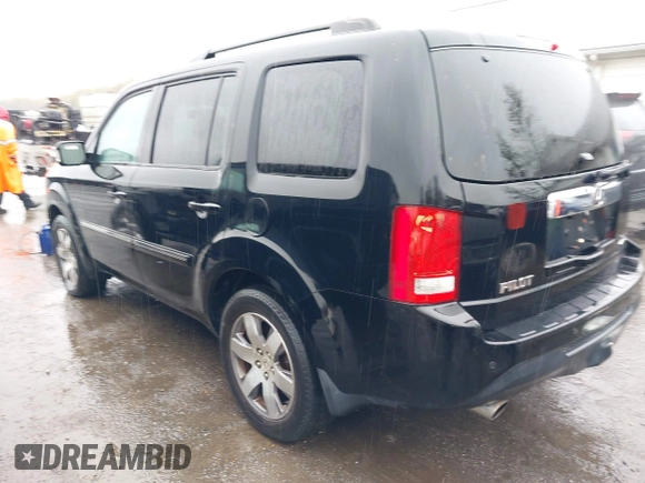 2014 Honda Pilot Touring with VIN 5FNYF4H91EB055741, listed as a IAAI auction lot 42006752 with 222,308 mi miles and . Bid and sale history available at carsss.com. Image 3.