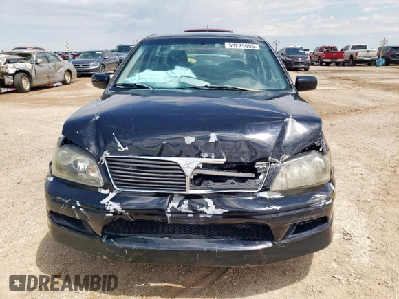 2002 Mitsubishi Lancer OZ-Rally z VIN JA3AJ86E32U001737, wystawiony jako Copart lot #59275695 z przebiegiem 177 332 mil mil oraz Szkoda całkowita • Salvage title. Historia ofert i sprzedaży dostępna na DreamBid. Obrazek 5.