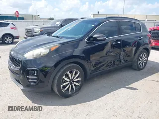 2019 Kia Sportage EX with VIN KNDPN3AC3K7543282, listed as a IAAI auction lot 42366436 with 86,928 mi miles and . Bid and sale history available at DreamBid. Image 2.