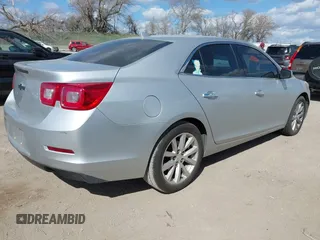 2013 Chevrolet Malibu LTZ with VIN 1G11H5SA3DF192011, listed as a IAAI auction lot 42022440 with 124,603 mi miles and . Bid and sale history available at DreamBid. Image 4.