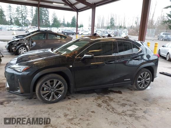 2021 Lexus UX with VIN JTHR9JBH5M2049855, listed as a IAAI auction lot 41237894 with 61,575 mi miles. Bid and sale history available at carsss.com. Image 14.