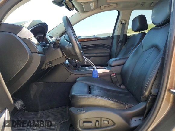 2015 Cadillac SRX Luxury Collection z VIN 3GYFNBE35FS555046, wystawiony jako Copart lot #57589155 z przebiegiem 108 456 mil mil oraz Szkoda całkowita • Salvage title. Historia ofert i sprzedaży dostępna na DreamBid. Obrazek 7.