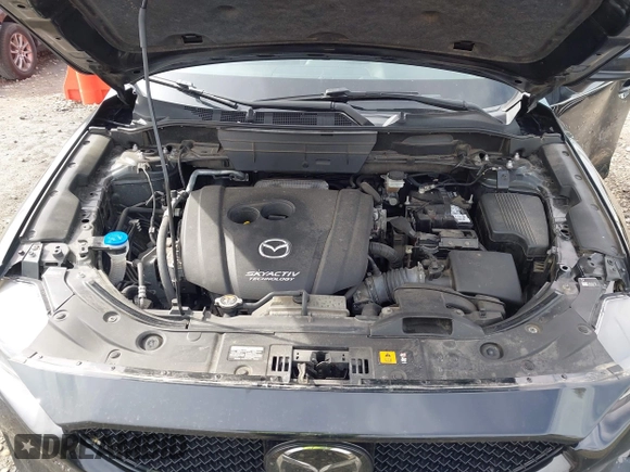 2018 Mazda CX-5 Touring with VIN JM3KFBCMXJ0438177, listed as a IAAI auction lot 42152275 with 65,434 mi miles and . Bid and sale history available at carsss.com. Image 10.