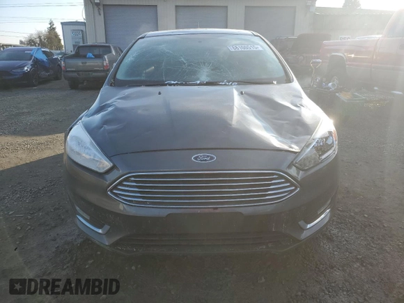 2017 Ford Focus Titanium with VIN 1FADP3N24HL287982, listed as a Copart auction lot 88100515 with 103,615 mi miles and Salvage Title. Bid and sale history available at carsss.com. Image 5.