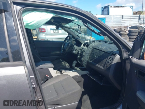 2011 Ford Escape XLT with VIN 1FMCU0D79BKB79697, listed as a IAAI auction lot 41265677 with 138,026 mi miles. Bid and sale history available at carsss.com. Image 5.