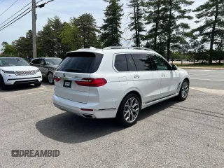2020 BMW X7 xDrive40i z VIN 5UXCW2C0XL9B92841, wystawiony jako Copart lot #58982025 z przebiegiem 127 416 mil mil oraz Czysty tytuł • Clean title. Historia ofert i sprzedaży dostępna na DreamBid. Obrazek 4.