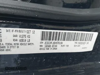 2013 Chrysler 300 SRT-8 with VIN 2C3CCAFJ9DH576184, listed as a IAAI auction lot 42162364 with 104,021 mi miles and . Bid and sale history available at carsss.com. Image 9.
