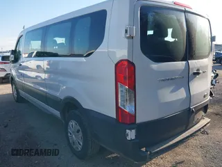 2021 Ford Transit Passenger XL z VIN 1FBAX2Y89MKA49850, wystawiony jako IAAI lot #41602893 z przebiegiem 74 248 mil mil oraz . Historia ofert i sprzedaży dostępna na DreamBid. Obrazek 3.