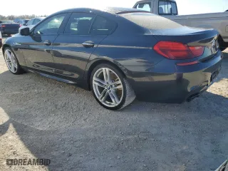 2015 BMW 6 Series 650i with VIN WBA6B2C58FD799063, listed as a Copart auction lot 77819914 with 0 mi miles and Salvage Title. Bid and sale history available at carsss.com. Image 2.