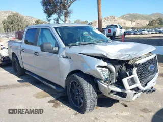 2018 Ford F-150 XL with VIN 1FTEW1CP9JKE15049, listed as a IAAI auction lot 41813119 with 107,818 mi miles. Bid and sale history available at carsss.com. Image 1.