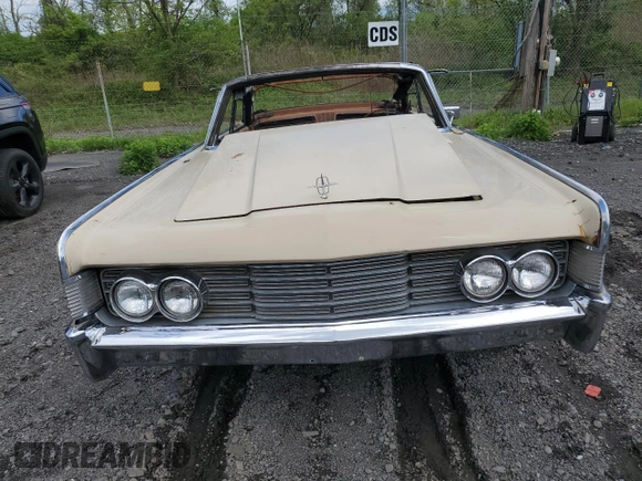 1965 Lincoln Continental z VIN 5Y86N428483, wystawiony jako Copart lot #56333345 z przebiegiem Nie podano mil oraz Szkoda całkowita • Salvage title. Historia ofert i sprzedaży dostępna na DreamBid. Obrazek 5.