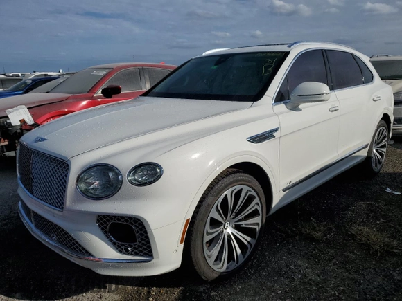 2022 Bentley Bentayga V8 z VIN SJAAM2ZV4NC011285, wystawiony jako Copart lot #75246624 z przebiegiem 33 179 mil mil oraz Nie do naprawy. Historia ofert i sprzedaży dostępna na DreamBid. Obrazek 1.