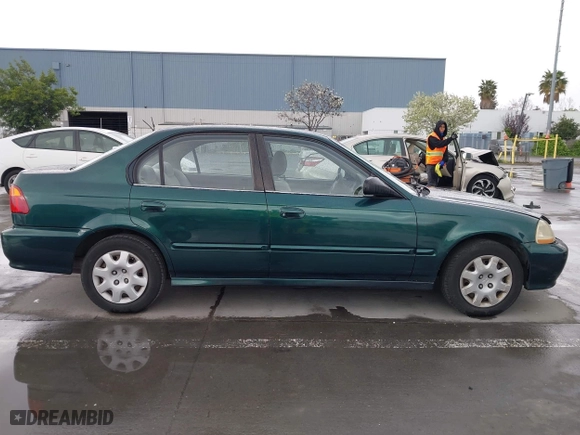 1999 Honda Civic VP with VIN 2HGEJ6618XH579736, listed as a IAAI auction lot 41912296 with 268,631 mi miles. Bid and sale history available at carsss.com. Image 14.