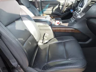 2019 Chevrolet Tahoe LT with VIN 1GNSKBKC7KR138999, listed as a IAAI auction lot 41339420 with 74,297 mi miles. Bid and sale history available at carsss.com. Image 5.