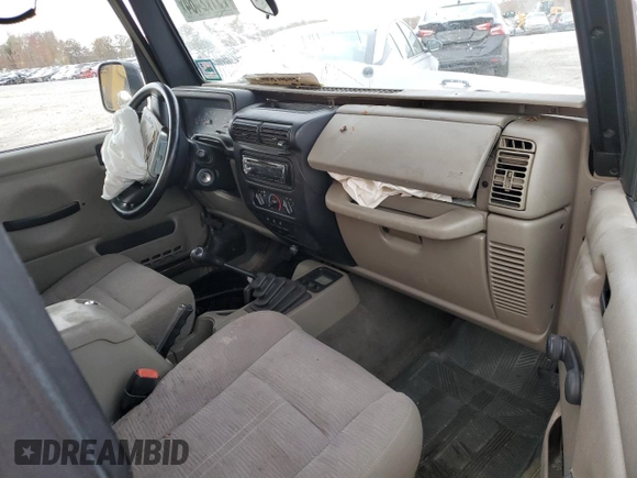 2003 Jeep Wrangler SE with VIN 1J4FA29183P324978, listed as a Copart auction lot 79172464 with Not provided miles and Salvage title. Bid and sale history available at DreamBid. Image 8.