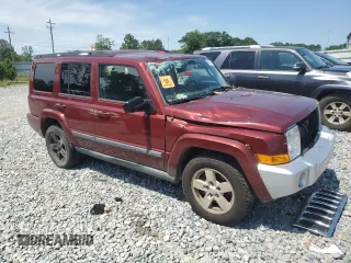 2007 Jeep Commander Sport with VIN 1J8HG48K07C684965, listed as a Copart auction lot 58061005 with 208,951 mi miles and Salvage title. Bid and sale history available at DreamBid. Image 4.