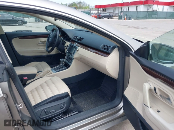 2012 Volkswagen CC Lux PZEV with VIN WVWHP7AN0CE552624, listed as a IAAI auction lot 42134600 with 122,543 mi miles. Bid and sale history available at carsss.com. Image 5.