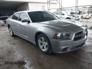 2014 Dodge Charger SE with VIN 2C3CDXBG5EH363292, listed as a IAAI auction lot 41888279 with 129,128 mi miles. Bid and sale history available at carsss.com. Image 1.