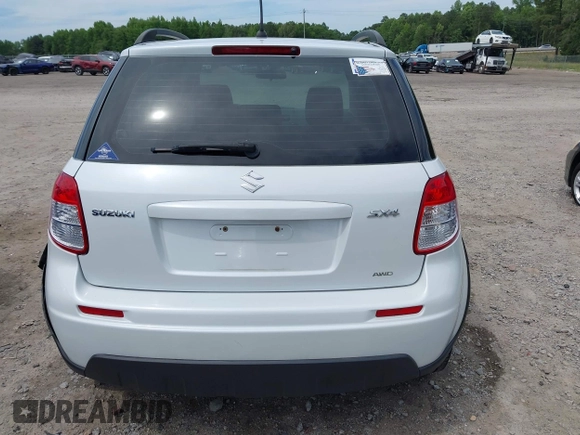 2012 Suzuki SX4 Crossover z VIN JS2YB5A35C6304967, wystawiony jako IAAI lot #42282088 z przebiegiem 152 232 mil mil oraz . Historia ofert i sprzedaży dostępna na DreamBid. Obrazek 16.