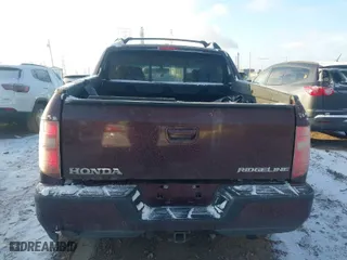 2009 Honda Ridgeline RTL with VIN 2HJYK16509H000803, listed as a IAAI auction lot 40993162 with 193,979 mi miles. Bid and sale history available at carsss.com. Image 16.