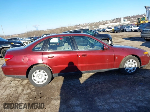 2001 Saturn LS z VIN 1G8JU52F41Y561483, wystawiony jako IAAI lot #41456949 z przebiegiem 130 852 mil mil oraz . Historia ofert i sprzedaży dostępna na DreamBid. Obrazek 12.