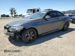 2016 BMW 2 Series M235i with VIN WBA1J7C5XGV359464, listed as a Copart auction lot 61499175 with 63,450 mi miles and Salvage title. Bid and sale history available at DreamBid. Image 1.