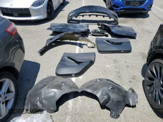 2022 Tesla Model Y Performance z VIN 7SAYGDEF2NF443037, wystawiony jako Copart lot #56870145 z przebiegiem 51 897 mil mil oraz Szkoda całkowita • Salvage title. Historia ofert i sprzedaży dostępna na DreamBid. Obrazek 13.
