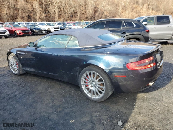 2009 Aston Martin DB9 with VIN SCFAD02E79GB10991, listed as a Copart auction lot 85487894 with 0 mi miles and Salvage Title. Bid and sale history available at carsss.com. Image 2.