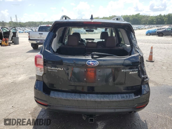 2017 Subaru Forester Touring z VIN JF2SJAWCXHH431232, wystawiony jako Copart lot #61625265 z przebiegiem 67 280 mil mil oraz Szkoda całkowita • Salvage title. Historia ofert i sprzedaży dostępna na DreamBid. Obrazek 6.