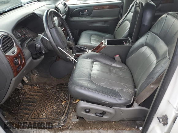 2004 GMC Envoy SLT z VIN 1GKDT13S242171925, wystawiony jako Copart lot #46262535 z przebiegiem 200 396 mil mil oraz Szkoda całkowita • Salvage title. Historia ofert i sprzedaży dostępna na DreamBid. Obrazek 7.