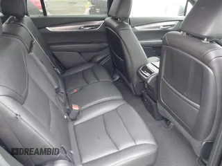 2024 Cadillac XT6 AWD Luxury with VIN 1GYKPBR45RZ750986, listed as a IAAI auction lot 42605419 with 50,929 mi miles and . Bid and sale history available at DreamBid. Image 5.