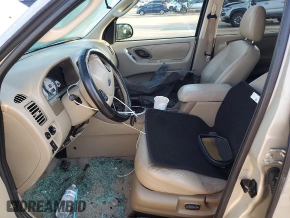 2005 Ford Escape Limited with VIN 1FMYU94195KB35872, listed as a Copart auction lot 63285755 with 145,638 mi miles and Salvage title. Bid and sale history available at DreamBid. Image 7.