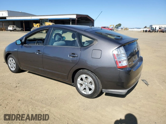 2007 Toyota Prius z VIN JTDKB20U573288978, wystawiony jako Copart lot #57469155 z przebiegiem 170 422 mil mil oraz Szkoda całkowita • Salvage title. Historia ofert i sprzedaży dostępna na DreamBid. Obrazek 2.