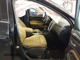 2014 Cadillac SRX Premium Collection with VIN 3GYFNGE35ES636852, listed as a IAAI auction lot 42283604 with 167,983 mi miles and . Bid and sale history available at DreamBid. Image 5.