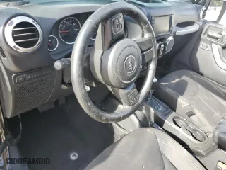 2016 Jeep Wrangler Unlimited Rubicon with VIN 1C4BJWFG7GL320650, listed as a Copart auction lot 53900195 with 77,620 mi miles and Salvage Title. Bid and sale history available at carsss.com. Image 8.
